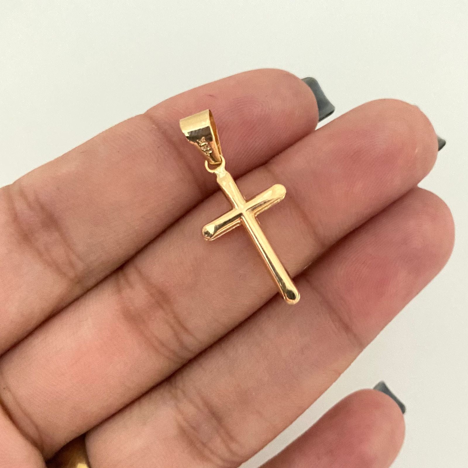 Dije cruz inflada lisa puntas biseladas Oro amarillo 18k 0,60 Gr / 3,0 Cm